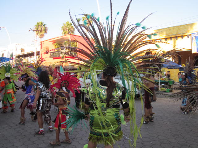 Dancers Wearing Feathered Costumes