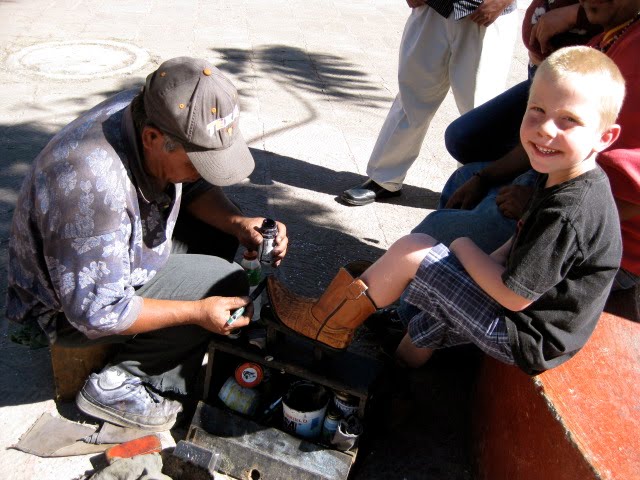 Little Boy Getting his Shoes Shined
