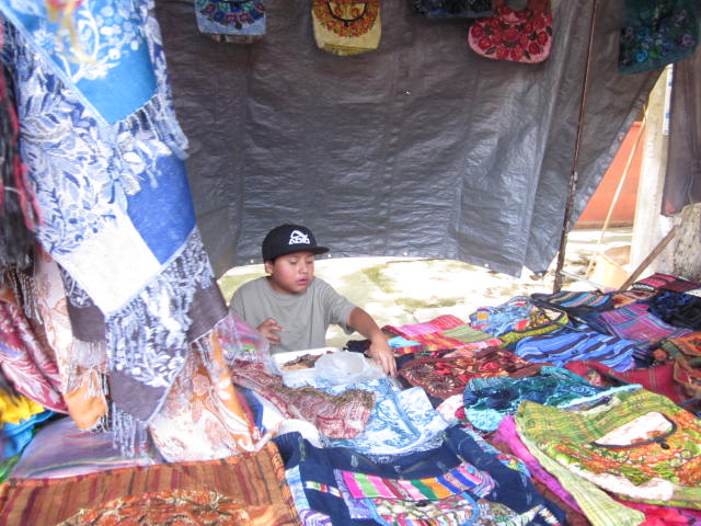 Young Boy at Family Stall