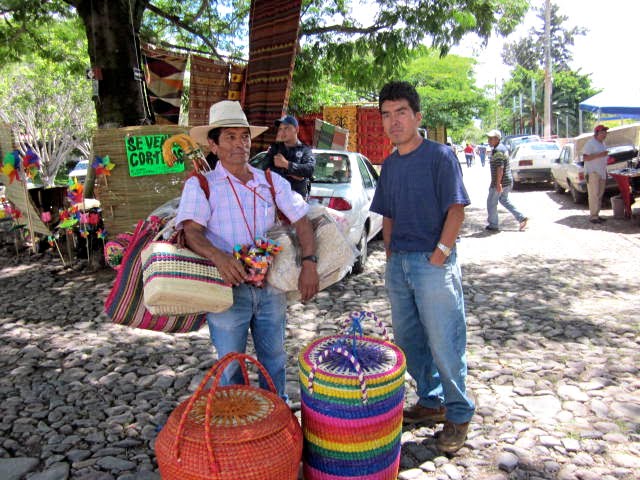 Man Selling Handmade Baskets at Market