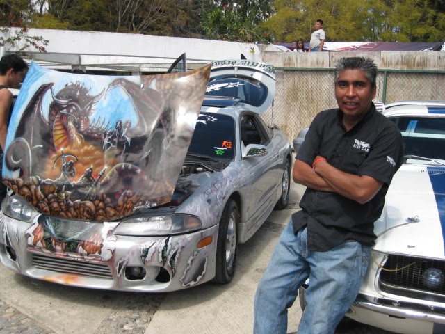 Man Showing off his Car