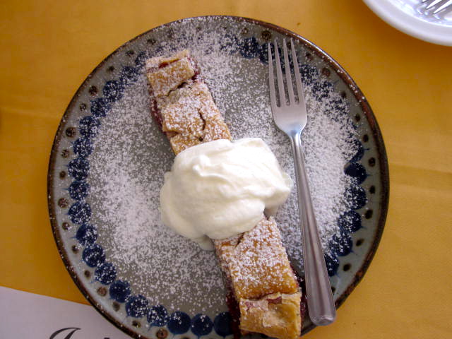Plum Filled Strudel with Whipped Cream