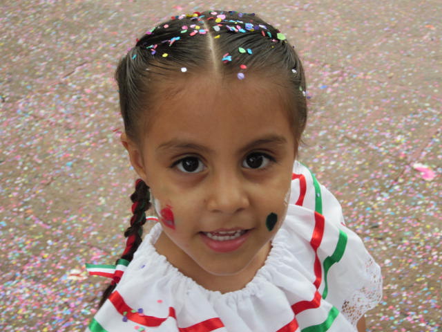 Little Girl with Confetti in her Hair
