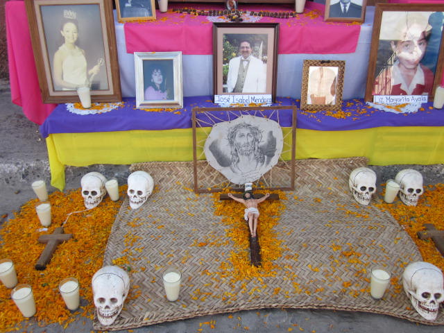 Skulls and candles on the altar