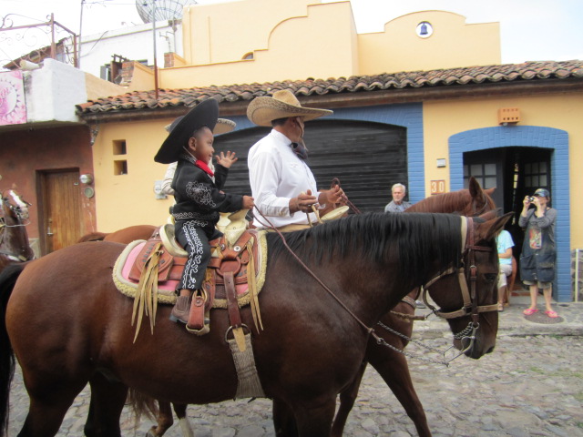 Boy Wearing a Mariachi Suit on a Horse