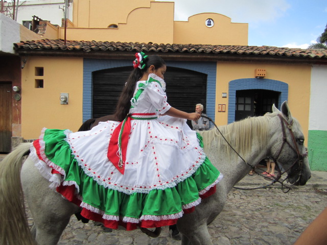 Girl in a Beautiful Dress on a Horse