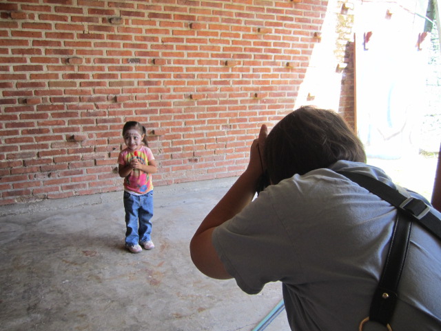 Little girl zombie getting her picture taken