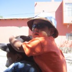 Boy on father's shoulders