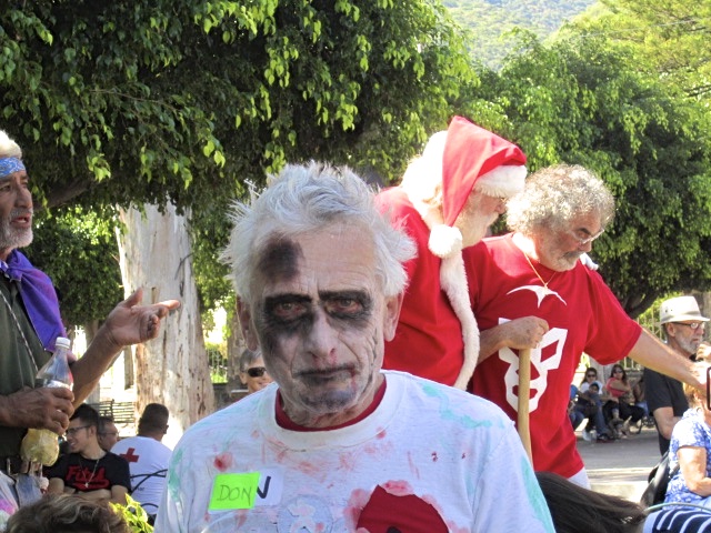 Zombie in front of Santa