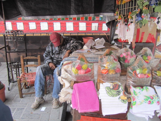 Man sleeping at stand