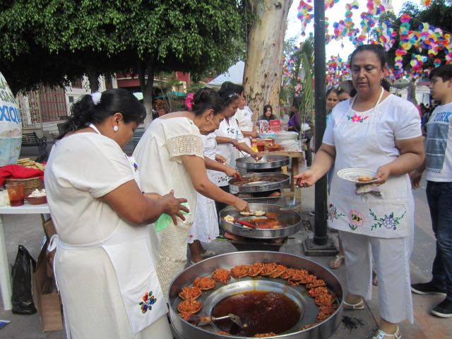 Women Cooking on Plaza