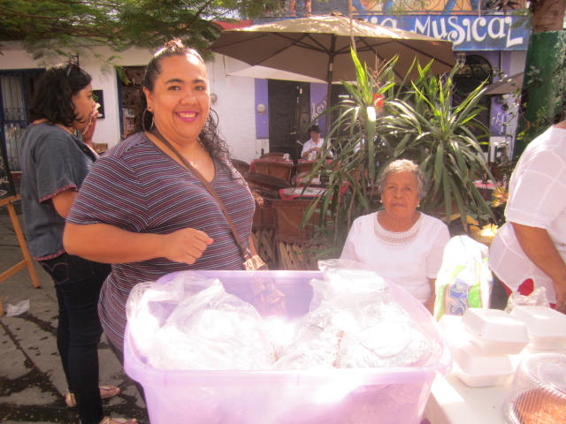 Woman selling sandwiches