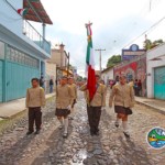 Escolta Students Holding Mexican Flag