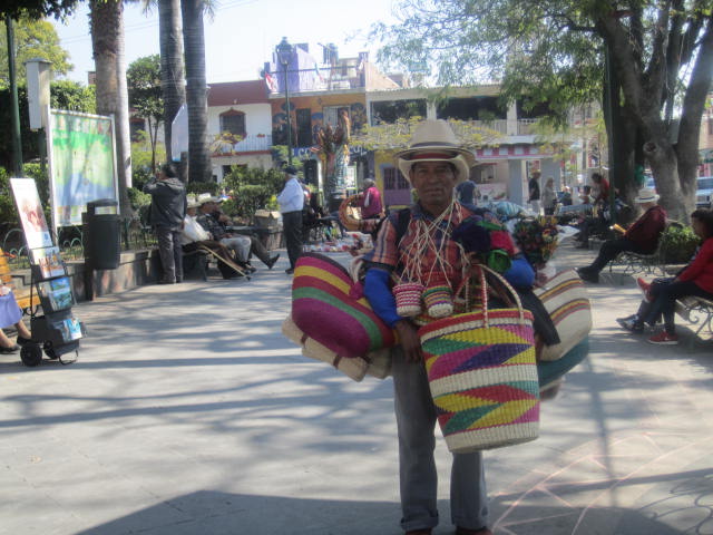 Man selling baskets