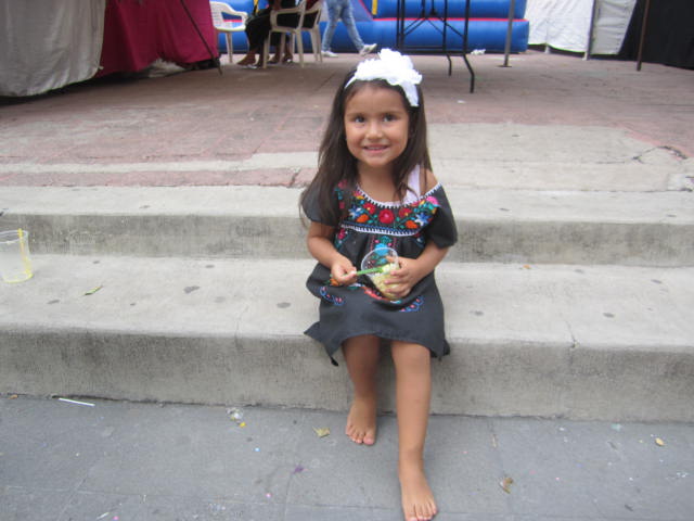 Girl eating corn