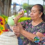 Mexican Woman Serving Juice